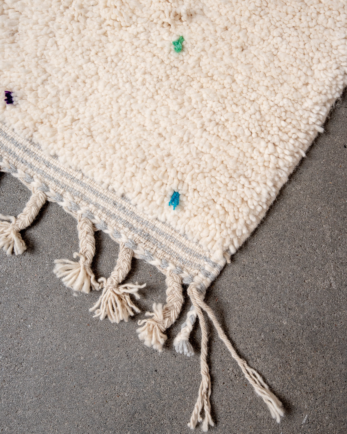Modern, designer, handcrafted Berber rug from Morocco. Beniourain carpet with beautiful colours and patterns and fluffy wool texture.